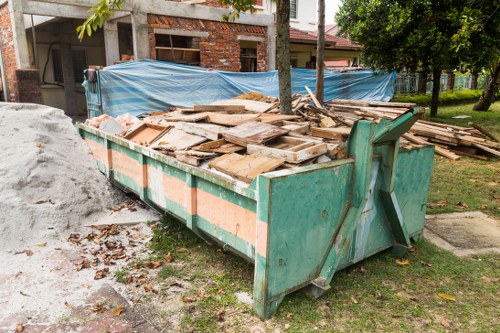 Inspector reviewing garden clearance site during investigation